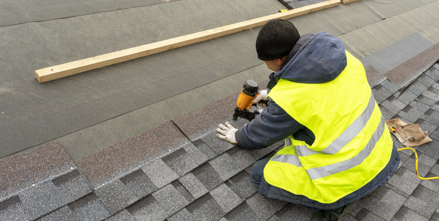 man working on the sidewalk